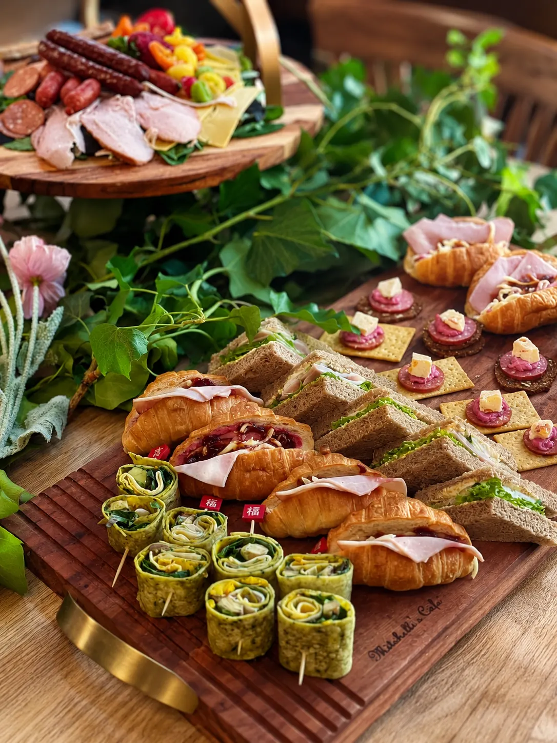 Prepared sandwiches and platters on a table at Mitchelli's Cafe Rinato