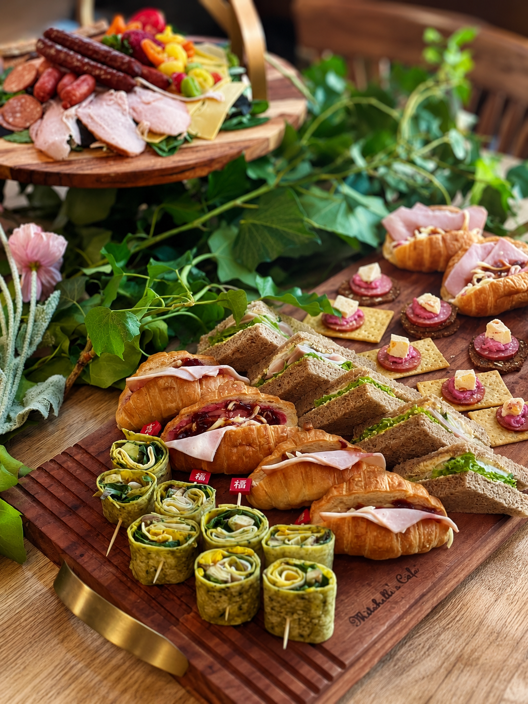 Prepared sandwiches and platters on a table at Mitchelli's Cafe Rinato